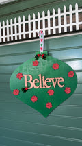 Green Ornament Believe Sign